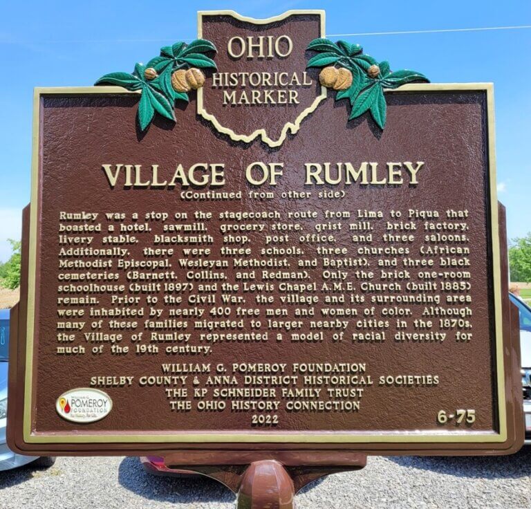 Close up picture of the Ohio historical marker for the Village of Rumley.