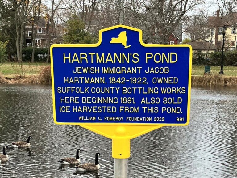 Historical marker for Hartmann's Pond. Marker funded by the William G. Pomeroy Foundation.