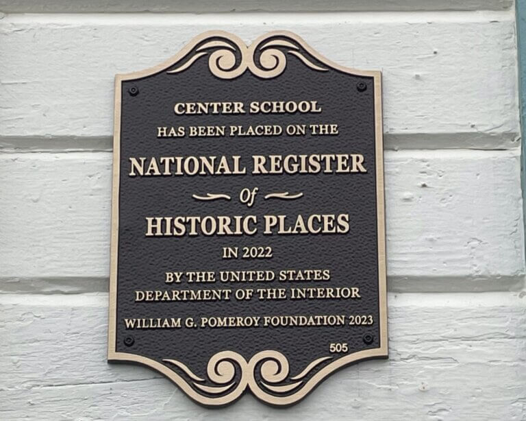 National Register plaque for Center School, Lopez Island, Washington. Plaque funded by the William G. Pomeroy Foundation.