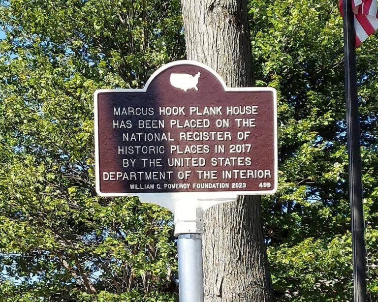 National Register marker for the Marcus Hook Plank House, Marcus Hook, Pennsylvania. Marker funded by the William G. Pomeroy Foundation.