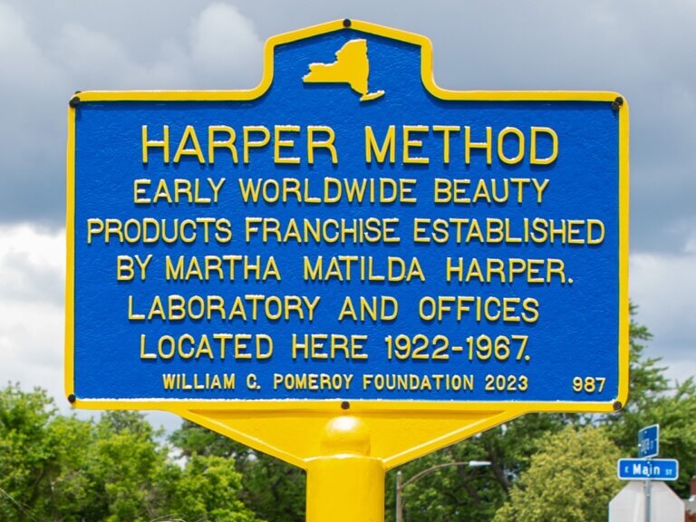 Historical marker for entrepreneur Martha Matilda Harper, Rochester, New York. Marker funded by the William G. Pomeroy Foundation.