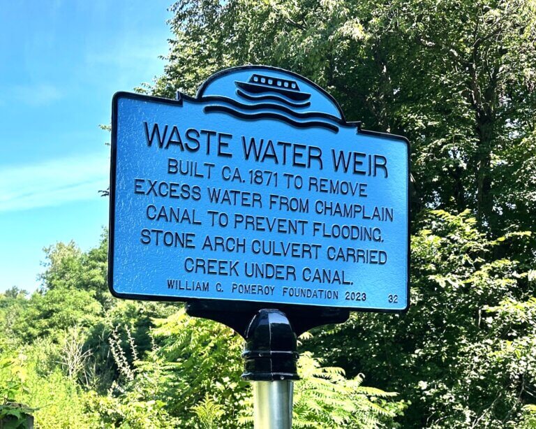 Historical marker funded by the William G. Pomeroy Foundation that commemorates Waste Water Weir, Mechanicville, N.Y.